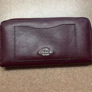 Burgundy coach wallet